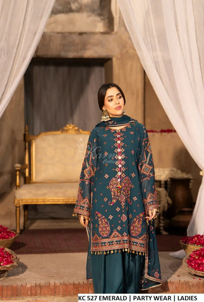 Emerald green georgette Pakistani women's short shirt with embroidered farshi shalwar side view