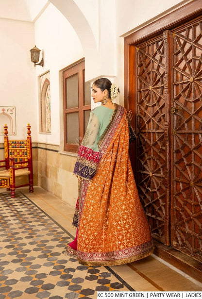 Mint green chiffon Pakistani women's long shirt with sharara side view