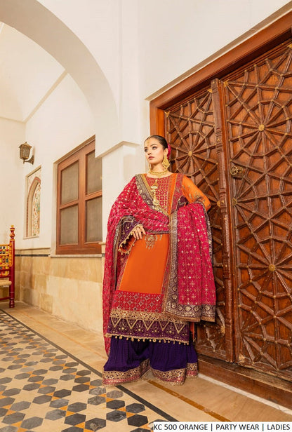Pakistani women's orange chiffon long shirt sharara back view