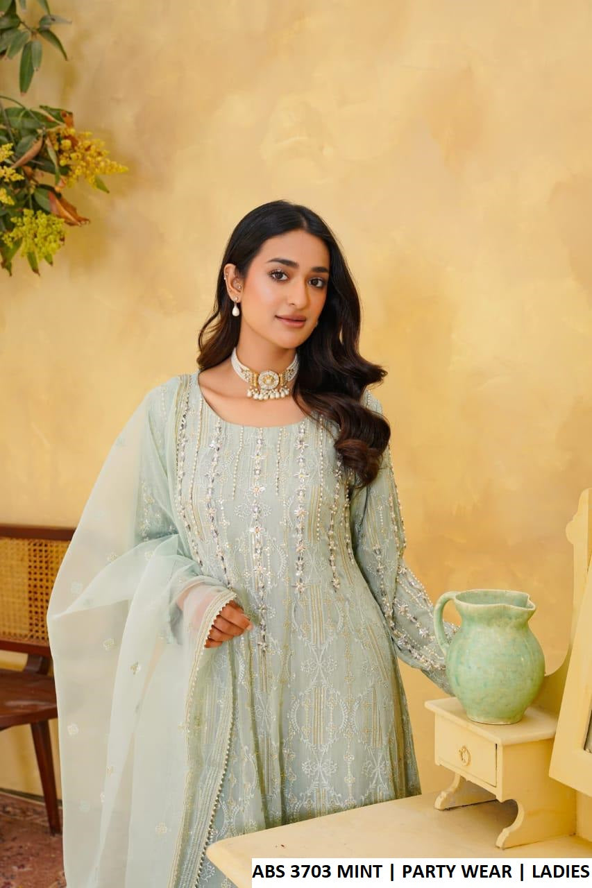 Mint green chiffon Pakistani women's frock side view