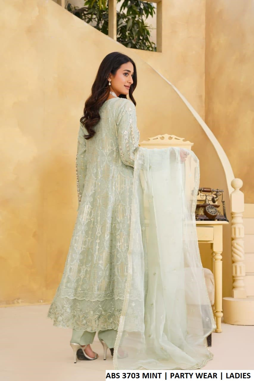 Pakistani women's mint green chiffon frock back view