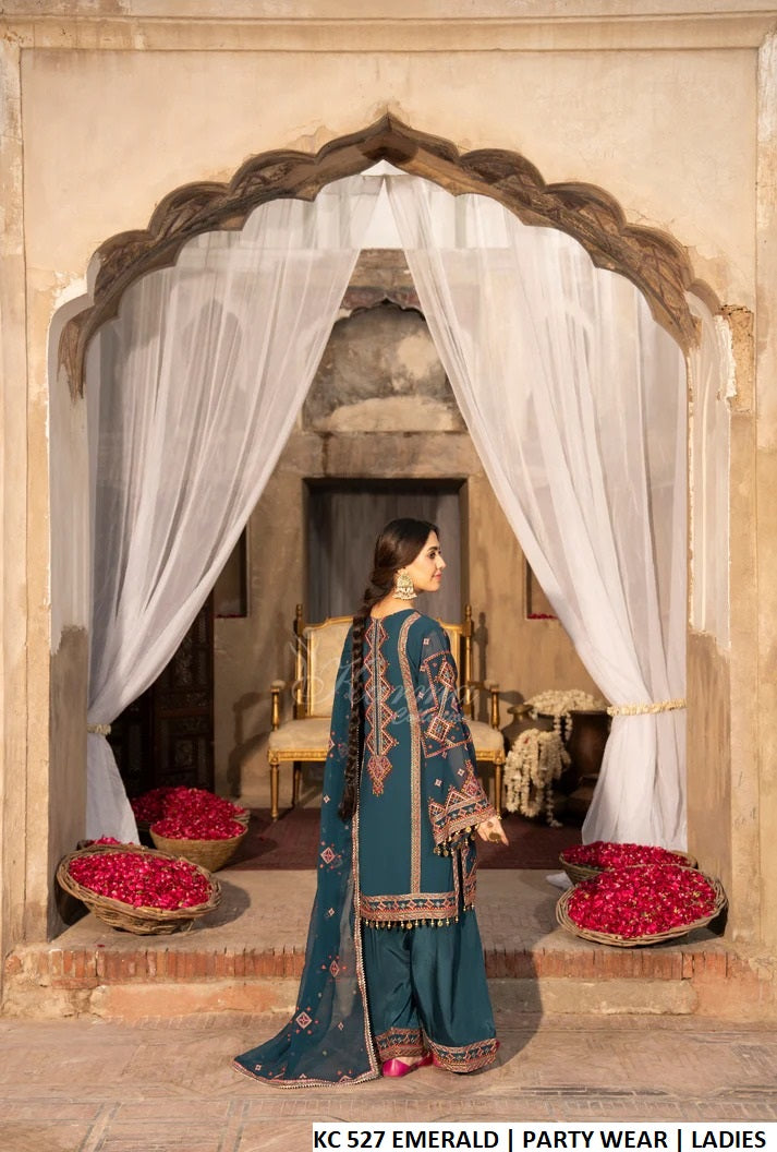 Pakistani women's emerald green georgette embroidered farshi shalwar outfit back view