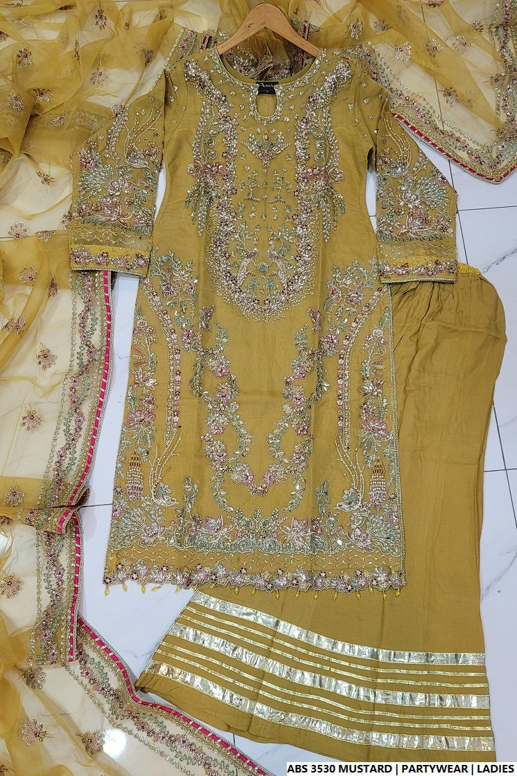 Pakistani women's mustard yellow organza straight shirt detail view