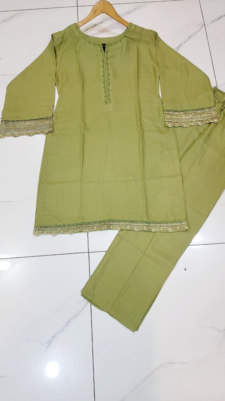 Pakistani women's pista green khaddar A-Line casual outfit back view