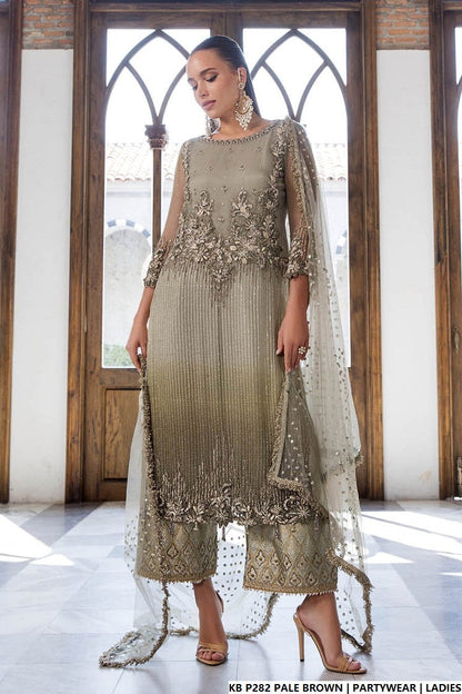 Pakistani women's pale brown hand embroidered luxury suit back view