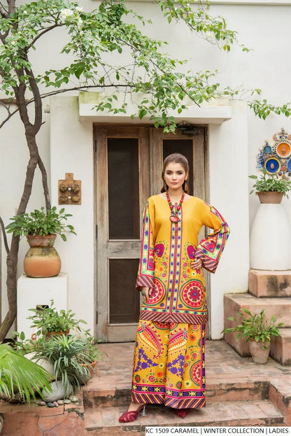 Pakistani women's caramel silk 2-piece formal suit back view