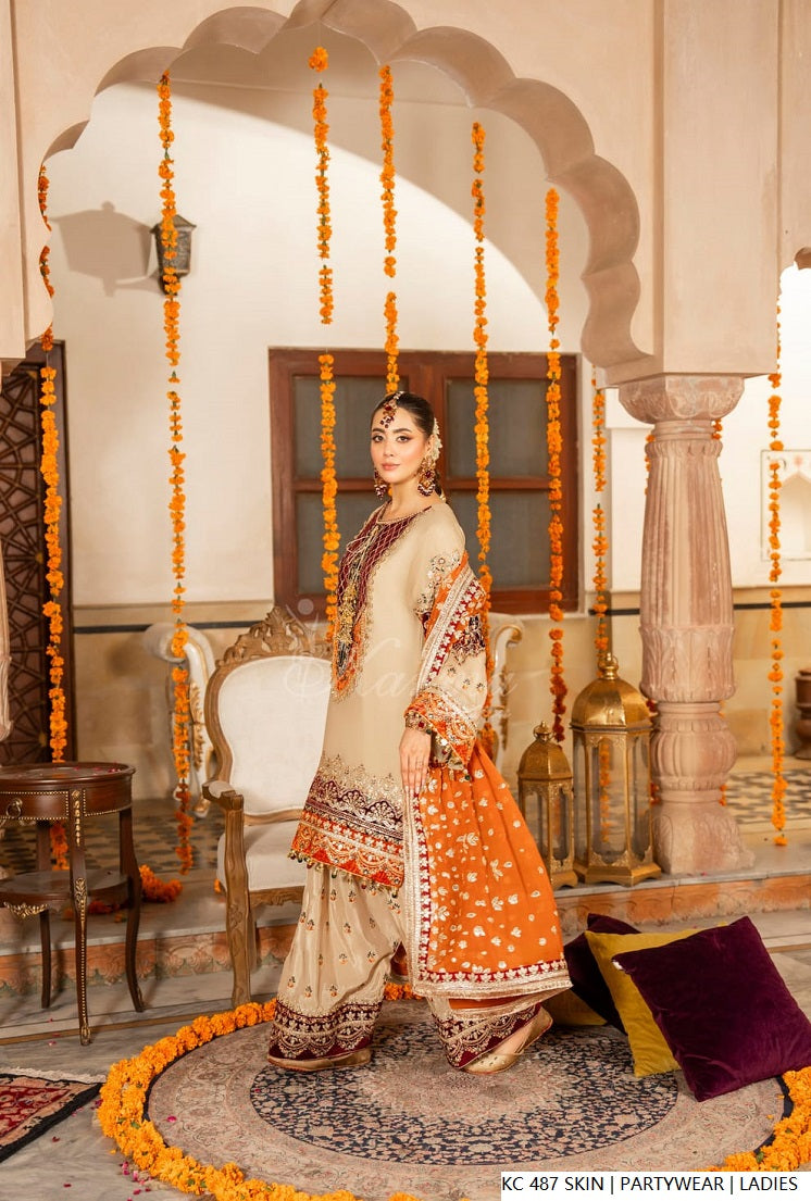 Pakistani women's skin silk long kaftan plazo back view