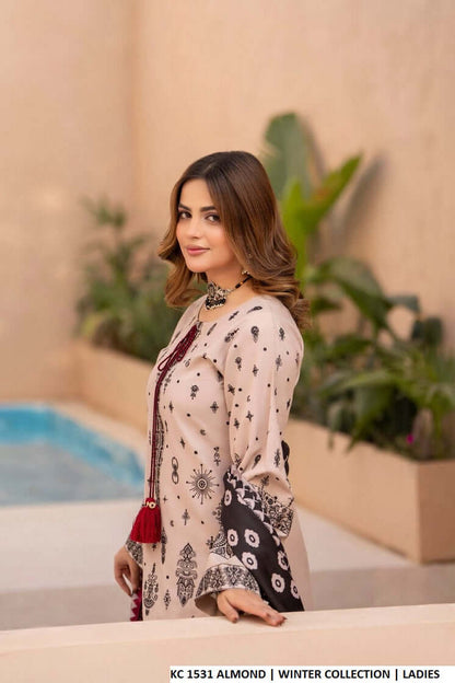 Pakistani women's almond silk short shirt farshi shalwar back view
