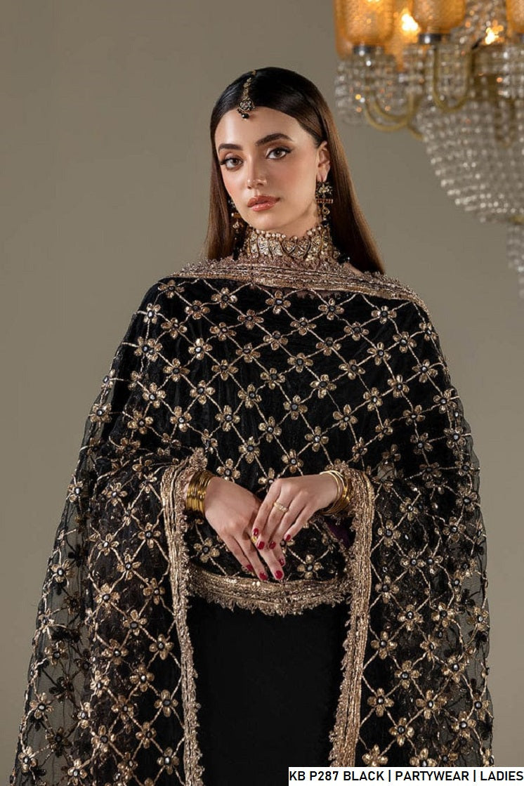 Pakistani women's black velvet embroidered suit back view