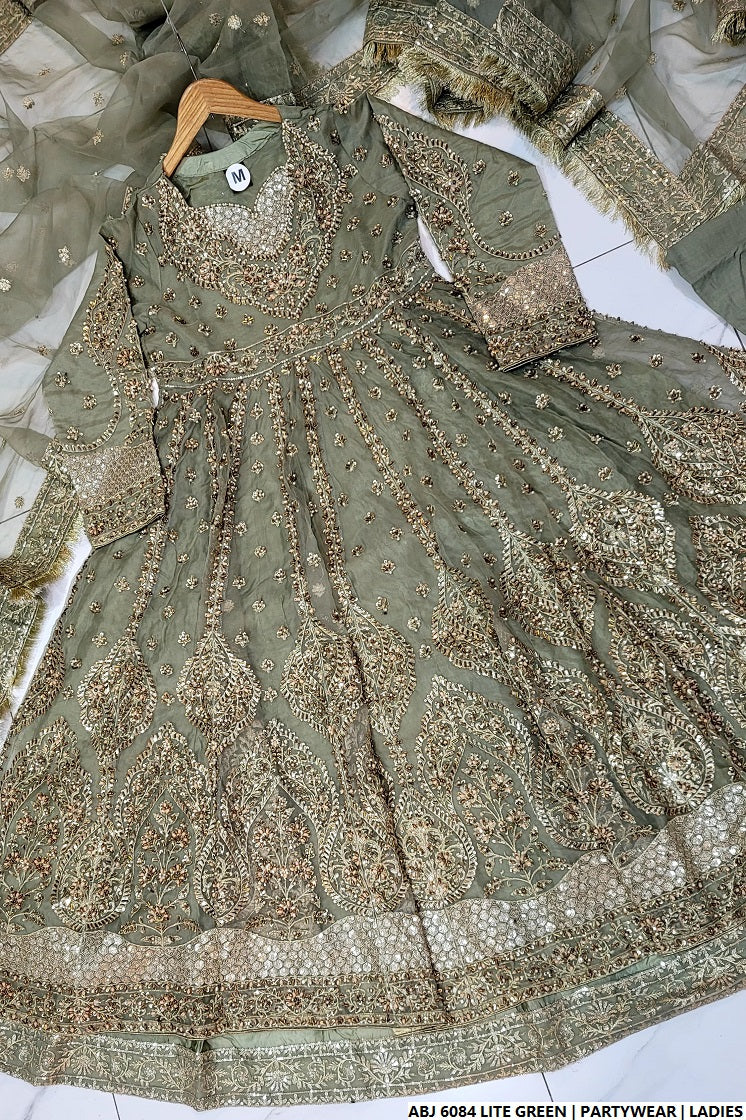 Pakistani women's light green chiffon short frock detail view