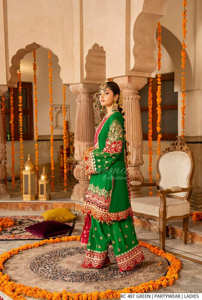 Pakistani women's green silk long kaftan plazo back view
