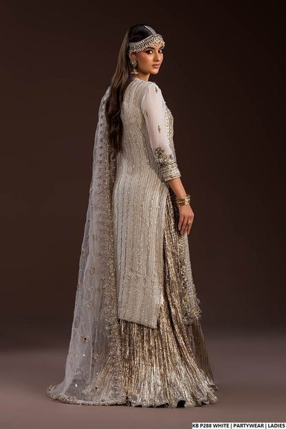 Pakistani women's white velvet embroidered suit detail view