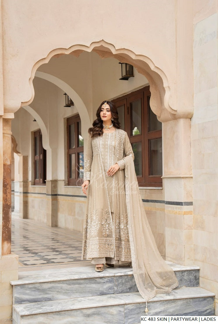 Pakistani women's skin silk long kaftan plazo back view