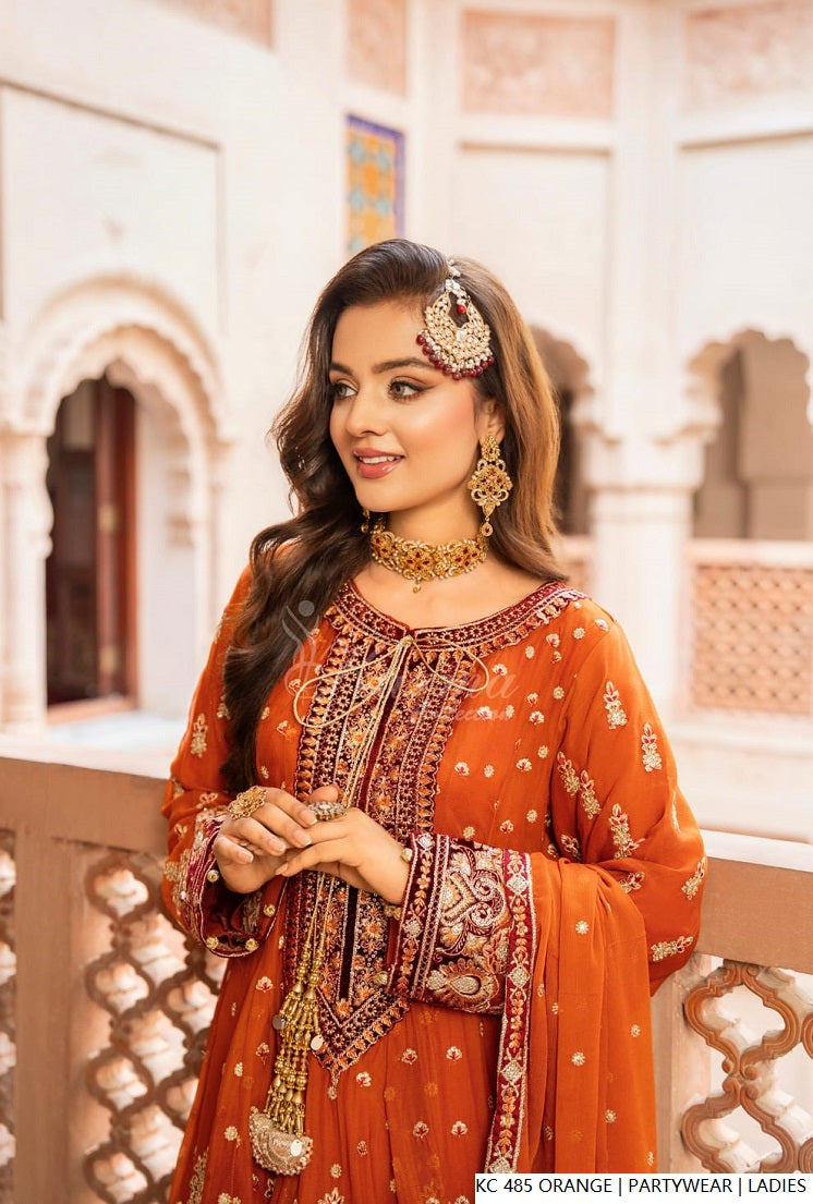 Orange silk Pakistani women's long kaftan with plazo side view
