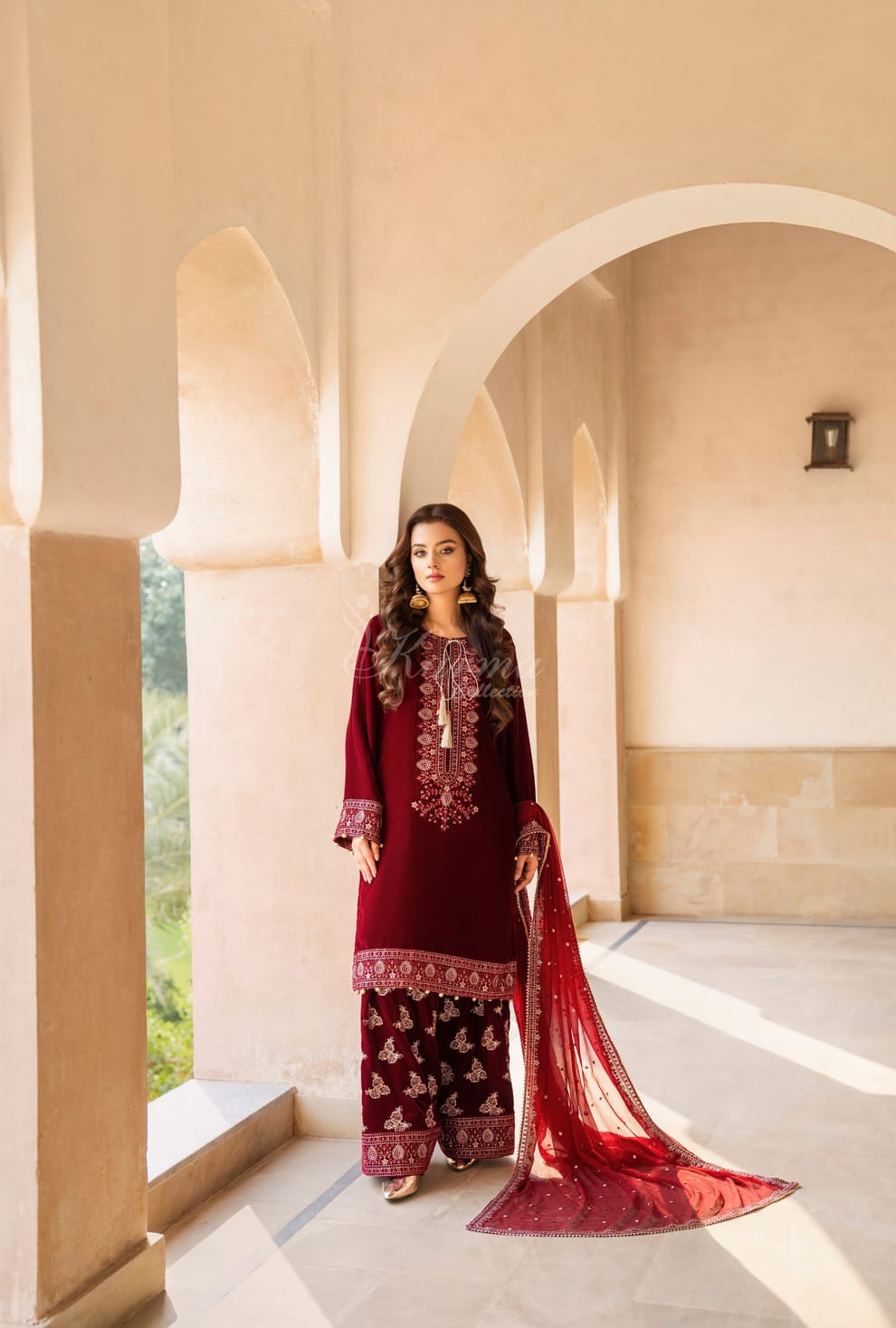 Pakistani women's maroon velvet long kaftan plazo full view