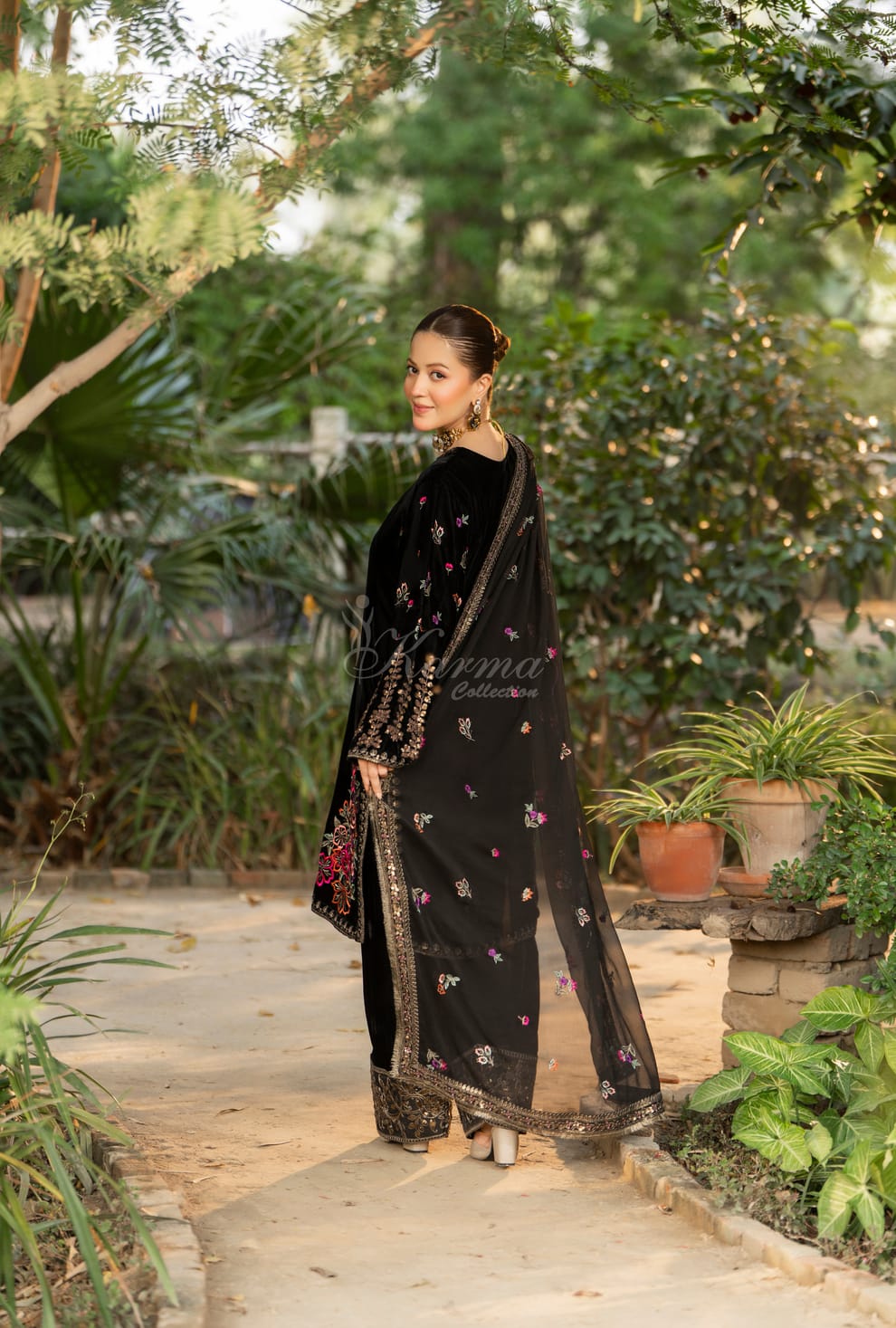 Pakistani women's black velvet long kaftan plazo full view