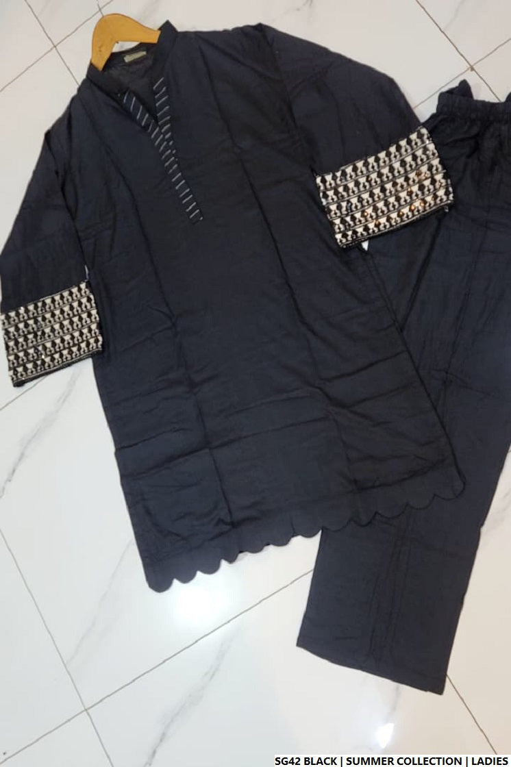 Pakistani women's black white lawn A-Line casual outfit back view