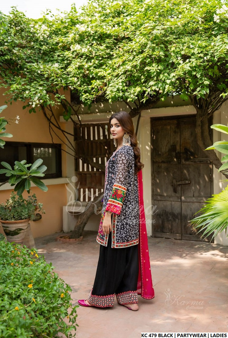 Pakistani women's black silk long kaftan back view