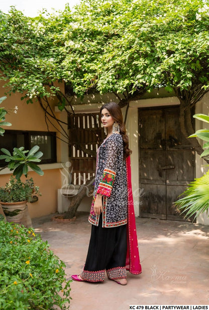 Pakistani women's black silk long kaftan back view