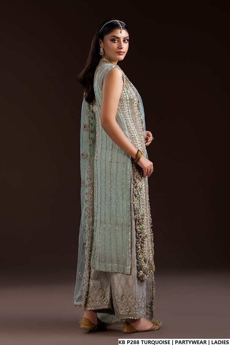Pakistani women's turquoise hand embroidered luxury suit back view