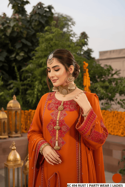 Pakistani women's rust silk long A-Line shirt plazo back view