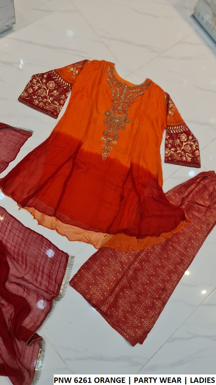 Pakistani women's orange chiffon frock plazo back view